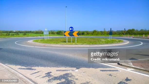 traffic circle, roundabout - traffic circle stock pictures, royalty-free photos & images