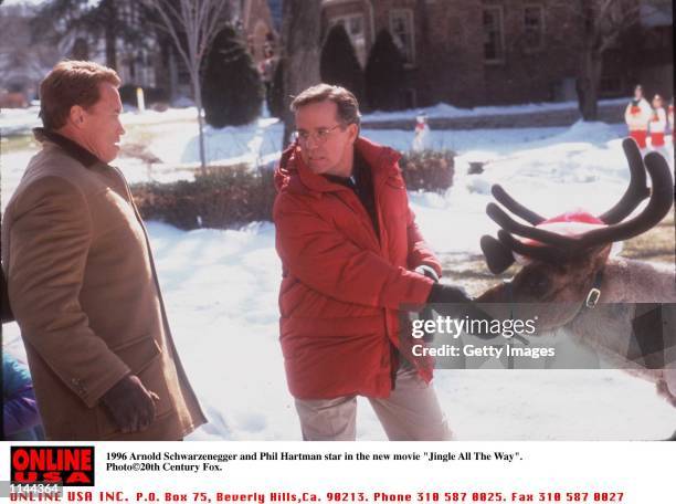 Arnold Schwarzenegger and Phil Hartman stars in the new movie "Jingle All The Way".