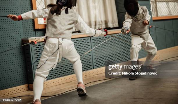 fencing motion - fencing sport stock pictures, royalty-free photos & images