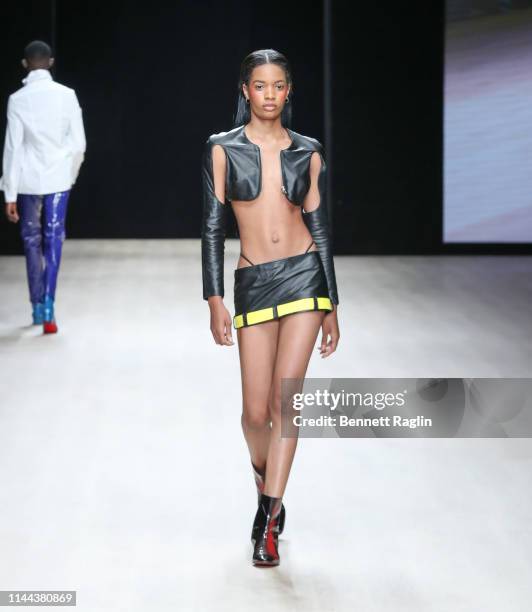 Model walks the runway wearing Mowalola during Arise Fashion Week on April 21, 2019 in Lagos, Nigeria.