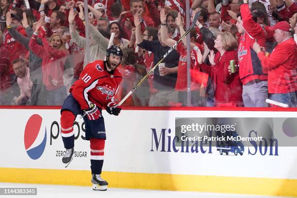 Brett Connolly of the Washington Capitals celebrates after scoring a goal in the second period against the Carolina Hurricanes in Game Five of the...