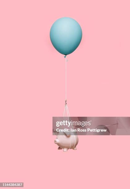floating piggybank - balloons concept imagens e fotografias de stock