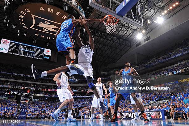 Kevin Durant of the Oklahoma City Thunder dunks against Brendan Haywood of the Dallas Mavericks during Game Two of the Western Conference Finals in...