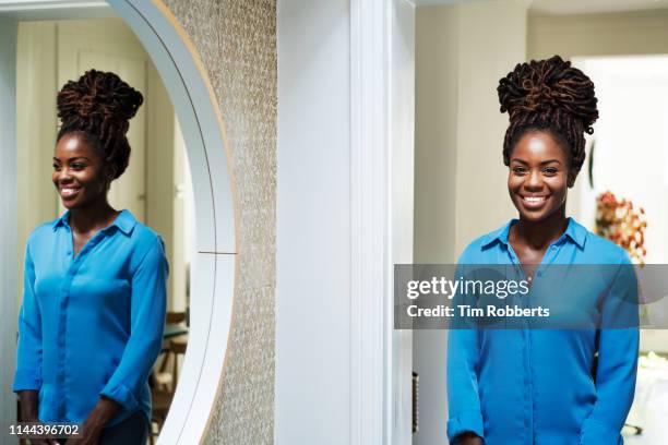 portrait of woman reflected in mirror - true peoples celebration day one stock pictures, royalty-free photos & images