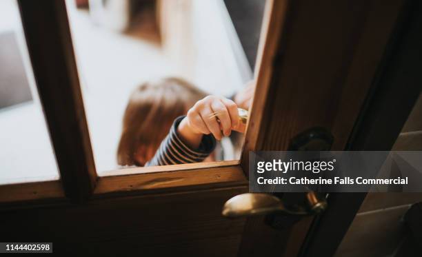 little hand - doorknob stock pictures, royalty-free photos & images