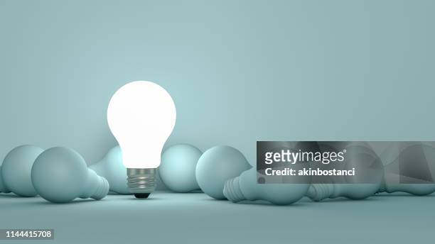 light bulbs, minimal idea concept - leadership concepts stock pictures, royalty-free photos & images