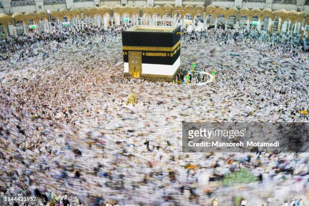 pilgrims in al-haram mosque - kaaba stock pictures, royalty-free photos & images