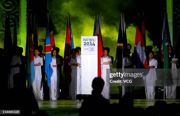 People attend the Nanjing 2014 Youth Olympic Games emblem unveiling ceremony at Xuanwu Gate square on May 19, 2011 in Nanjing, Jiangsu Province of...