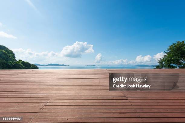 seaside wooden parking lot - utedäck bildbanksfoton och bilder