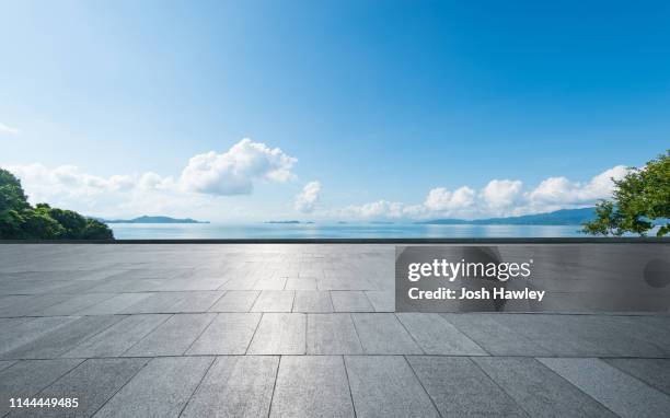 seaside parking lot - brick road stock pictures, royalty-free photos & images