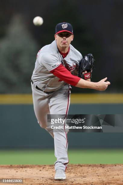 Starting pitcher Jeremy Hellickson of the Washington Nationals throws in the first inning against the Colorado Rockies at Coors Field on April 22,...
