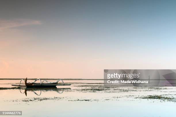 fishing boat at the beach - made widhana stock pictures, royalty-free photos & images