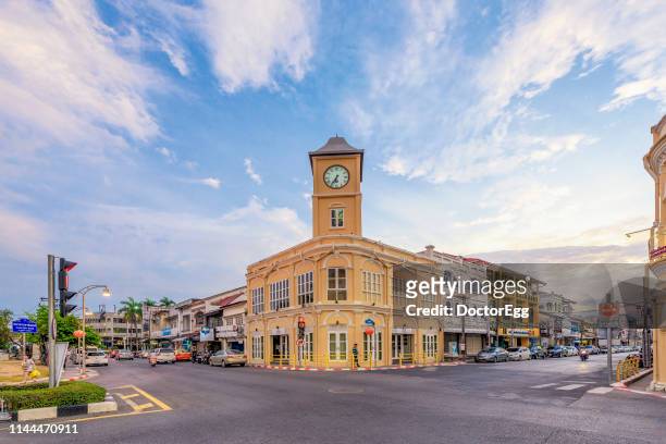 clock tower landmark of phuket, old town, phuket, thailand - phuket old town stock-fotos und bilder