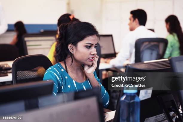 busy female business executive at her office - india partition stock pictures, royalty-free photos & images