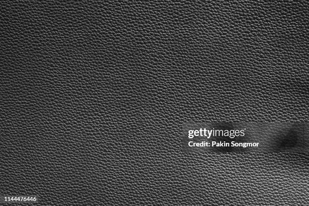 close up detail black leather and texture background - black leather fotografías e imágenes de stock