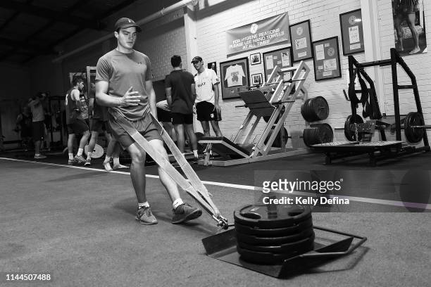 Matt Clements works out in the gym during a Prokick Australia training session on April 17, 2019 in Glen Waverley, Australia.