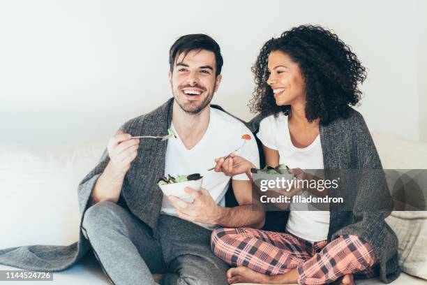 couple in love eating salad - perfection salad stock pictures, royalty-free photos & images