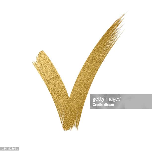 gold glitter icon. tick sign. checkmark ok icon. glitter golden brush stroke on white background - brushed gold background stock illustrations