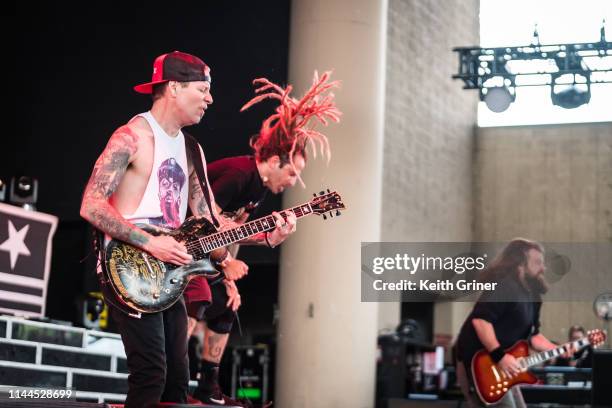 Willie Adler, Randy Blythe and Mark Morton of Lamb of God perform at Ruoff Home Mortgage Music Center on May 16, 2019 in Noblesville, Indiana.