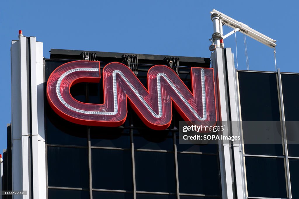 The CNN logo is seen atop its bureau in Los Angeles,...