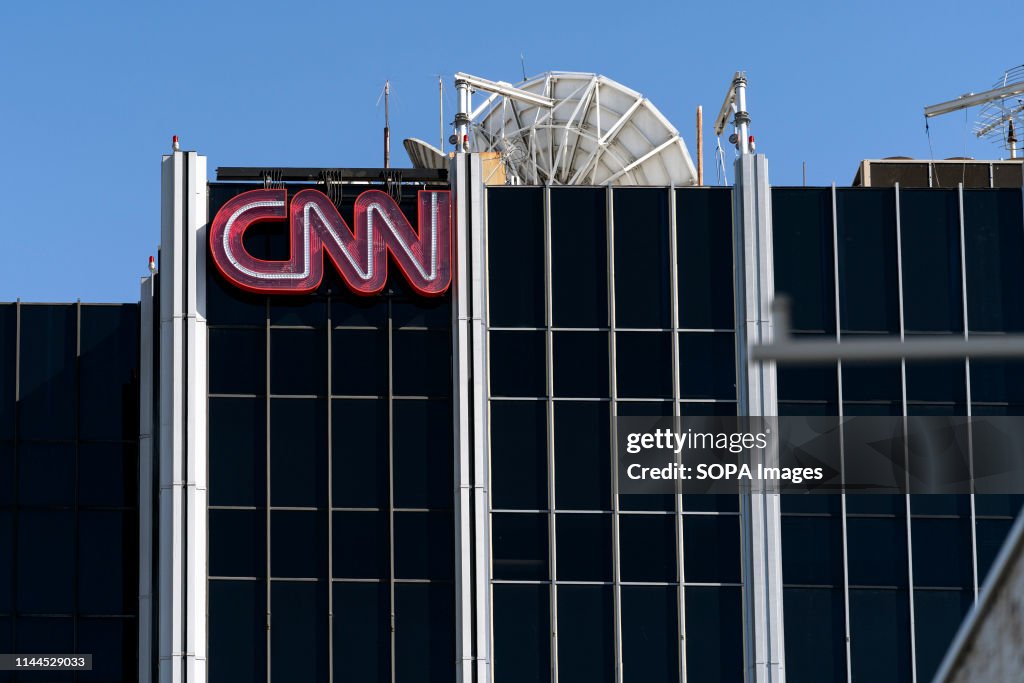 The CNN logo is seen atop its bureau in Los Angeles,...