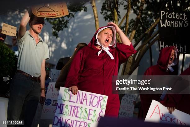 Margeaux Hartline participates in a protest against HB314, which would ban abortions in all cases except the health of the mother, outside the...