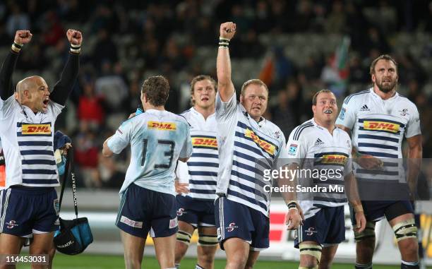 Conrad Jantjes and Steven Kitshoff of the Stormers raise their arms in celebration after the television match official awards their try during the...