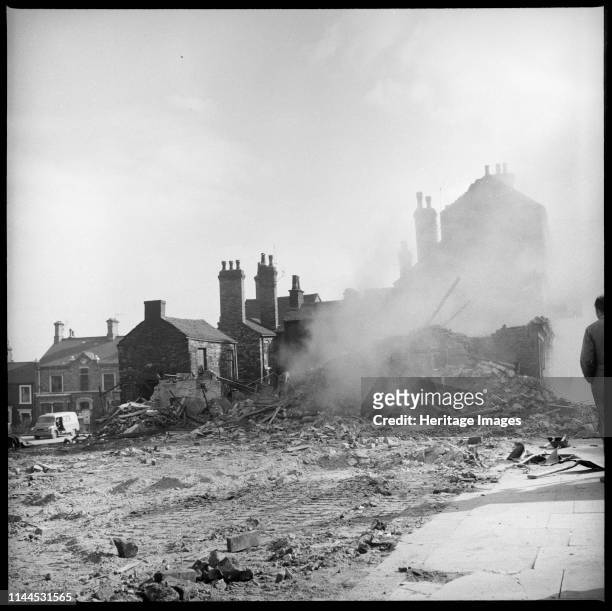 Demolition work in progress, Lichfield Street, Hanley, Stoke-on-Trent, 1965-1968. The demolition of houses on the east side of Lichfield Street with...