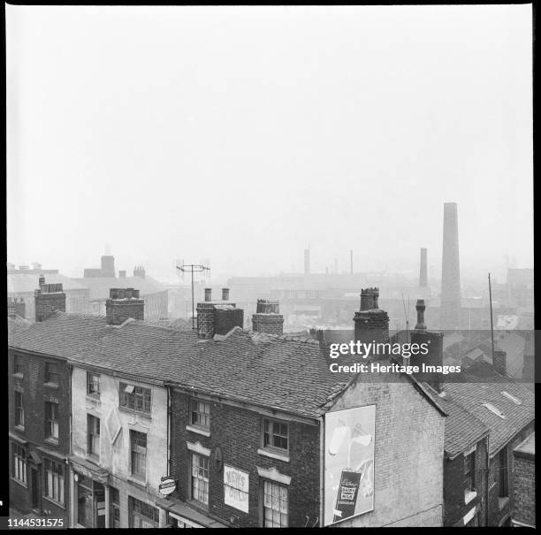 Nile Street, Burslem, Stoke-on-Trent, 1965-1968. An elevated view from a window of the George Hotel looking south with numbers 12-16 Nile Street and...