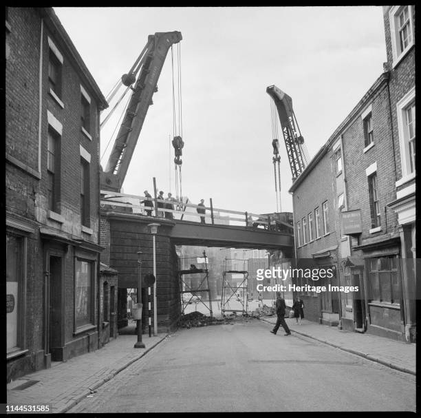 Caroline Street, Longton, Stoke-on-Trent, 1965-1968. A view looking west along Caroline Street showing repair work being carried out on the bridge...