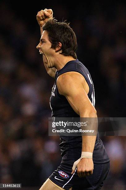 Nick Duigan of the Blues celebrates kicking a goal during the round nine AFL match between the Carlton Blues and the Geelong Cats at Etihad Stadium...