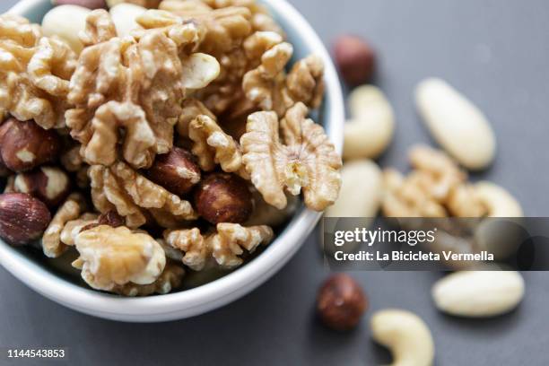 assorted dried fruits - ナッツ類 ストックフォトと画像