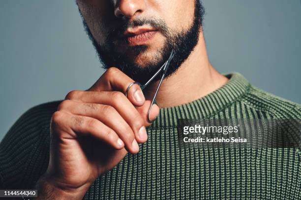 how he keeps his beard looking good - cutting stock pictures, royalty-free photos & images