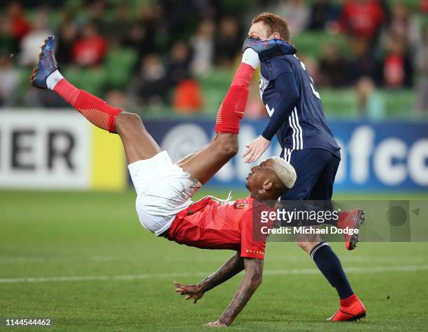 Anderson Talisca of Guangzhou Evergrande attempts a scissor kick for goal against Corey Brown of the Victory during the round 1 AFC Champions League...
