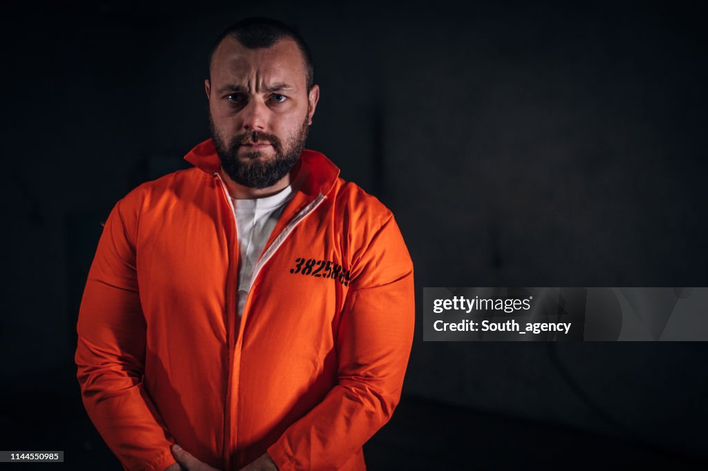 Inmate Images Convict In Orange Jumpsuit High-Res Stock Photo - Getty Images