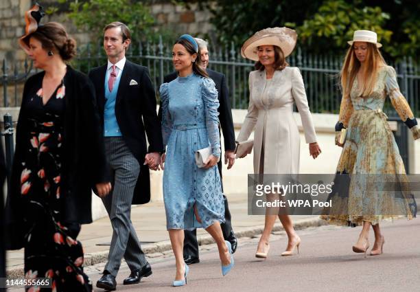 James Matthews and his wife Pippa followed by Pipa's parents Michael and Carole Middleton arrive for the wedding of Lady Gabriella Windsor and Thomas...