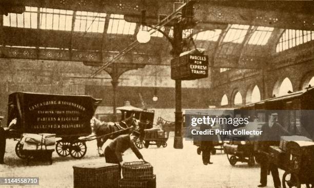 Overhead Electric Parcel Carrier, Victoria Station, Manchester', 1930. From "The Wonder Book of Railways", edited by Harry Golding. [Ward, Lock &...