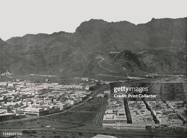 General view showing the Camel Market, Aden, 1895. The port city of Aden in the Yemen, with mountains beyond. From "Round the World in Pictures and...