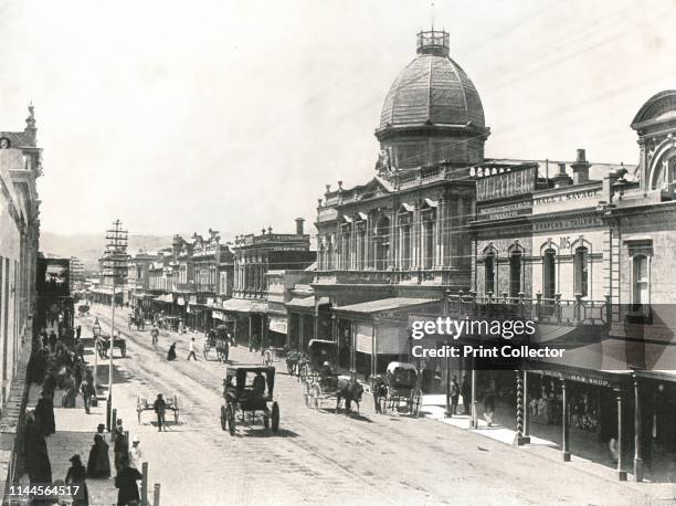 Rundle Street, Adelaide, Australia, 1895. The building with the dome is the Adelaide Arcade which opened in 1885. The first electric street lighting...