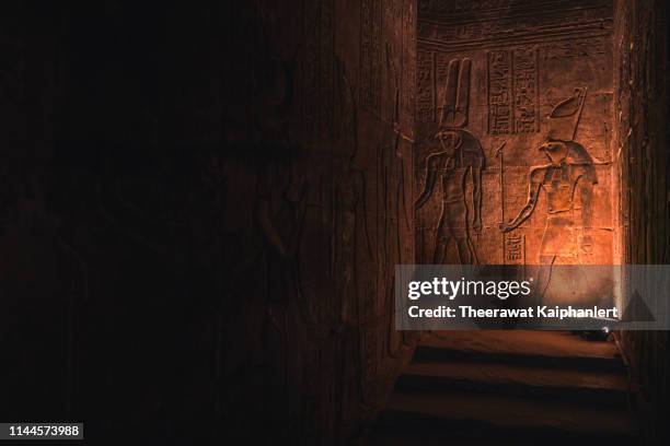 hieroglyphs on the walls of the temple of horus in edfu, egypt - edfu stock pictures, royalty-free photos & images