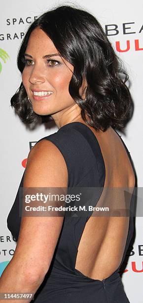 Actress Olivia Munn attends the Opening Night of "Beauty Culture" at The Annenberg Space For Photography on May 19, 2011 in Century City, California.