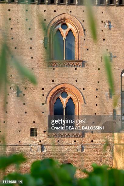 Gothic double-arched windows, detail of Visconti Castle, built between 1360 and 1366 by Galeazzo II Visconti, Pavia, Lombardy, Italy, 14th century.