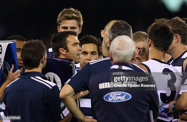 Chris Scott the coach of the Cats talks to his players during the round nine AFL match between the Carlton Blues and the Geelong Cats at Etihad...