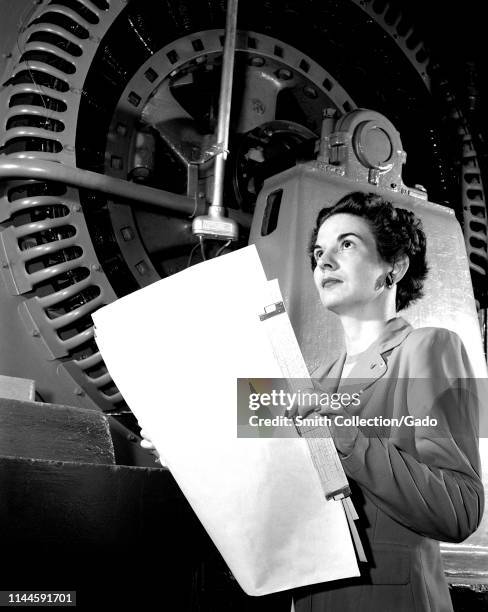 Half length portrait of electrical engineer Kitty Joyner at Langley Research Center, Hampton, Virginia, 1952. Image courtesy National Aeronautics and...