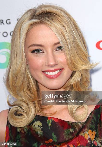 Actress Amber Heard attends the Opening Night of "Beauty Culture" at The Annenberg Space For Photography on May 19, 2011 in Century City, California.