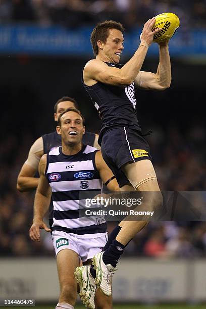 Bret Thornton of the Blues marks during the round nine AFL match between the Carlton Blues and the Geelong Cats at Etihad Stadium on May 20, 2011 in...