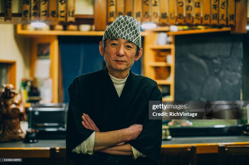 Portret van een Japanse sushi chef