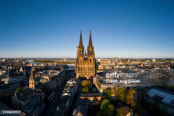 cologne cathedral at sunset - spire stock pictures, royalty-free photos & images