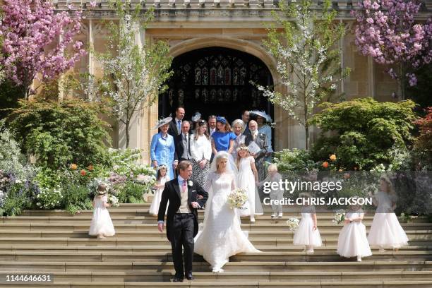 Newlyweds Thomas Kingston and Lady Gabriella Windsor walk down the steps with their bridesmaids, page boys and guests after their wedding ceremony,...