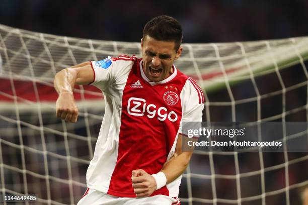 Dusan Tadic of Ajax celebrates after he takes and scores his second penalty and his teams fourth goal of the match during the Eredivisie match...